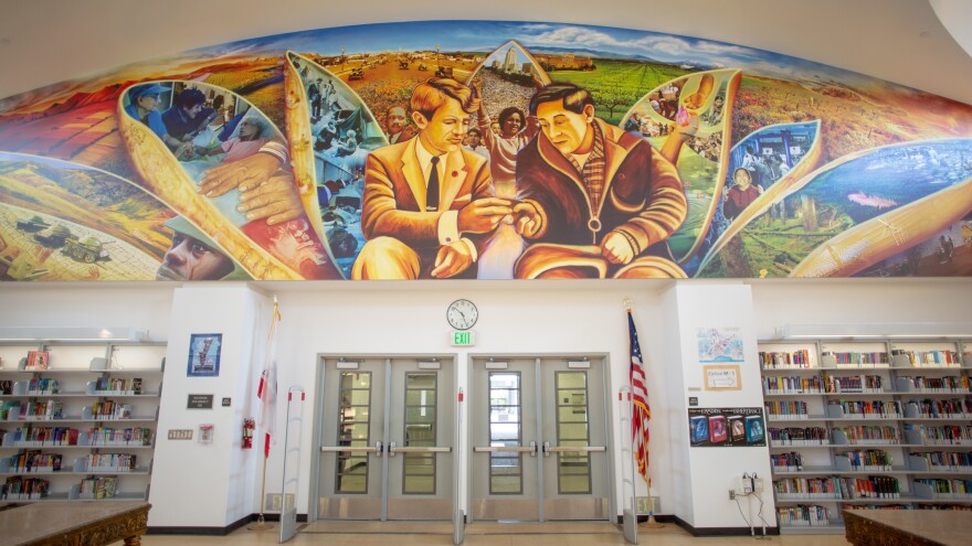 Many murals line the walls at the Robert F. Kennedy Community Schools, like this one in the library.