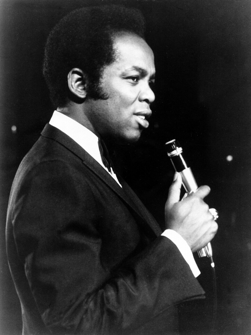Lou Rawls performs in January 1971. The singer was one of a few black performers who got their start working the Chitlin' Circuit.