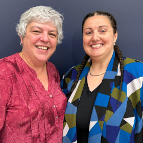 photo of two women smiling