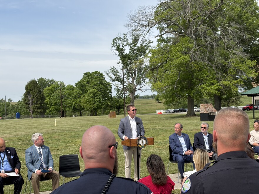 Gov. Andy Beshear addresses corrections officers and others before signing House Bill 5.