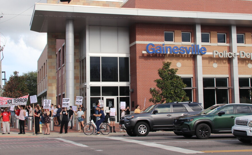 Protesters can be seen outside the Gainesville Police Department on Thursday, Sept. 3, 2026. (María Sofía Rodríguez/WUFT News)