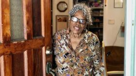  Opal Lee, 93, opens her front door and warmly greets her new visitor. 