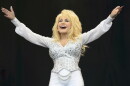 FILE - Dolly Parton performs at Glastonbury music festival, June 29, 2014. (Photo by Jonathan Short/Invision/AP, File)