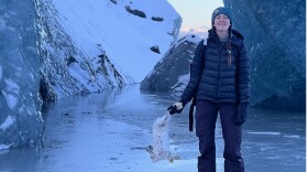 Kelsey Haas poses with snowshoe hare at Grewingk Glacier on Nov. 26, 2022.