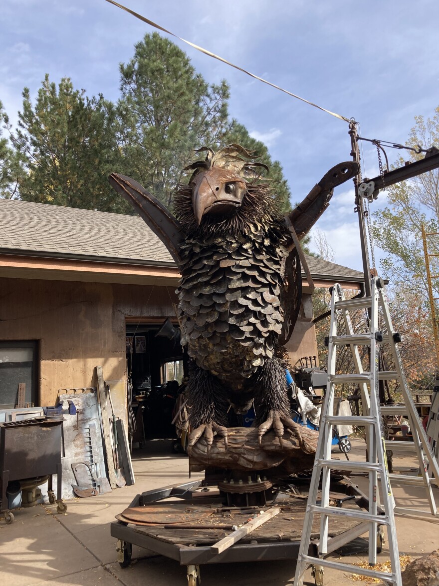 A metal phoenix that’s almost 20 feet high is made out of 8-inch steel.