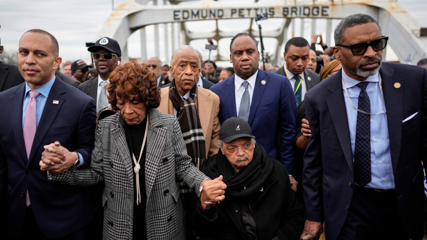 FILE - U.S. Rep. Hakeem Jeffries, D-NY, U.S. Rep. Maxine Waters, D-Calif., Rev. Al Sharpton, Rev. Jesse Jackson and NAACP President Derrick Johnson march across the Edmund Pettus bridge during the 60th anniversary of the march to ensure that African Americans could exercise their constitutional right to vote, March 9, 2025, in Selma, Ala. (AP Photo/Mike Stewart, File)