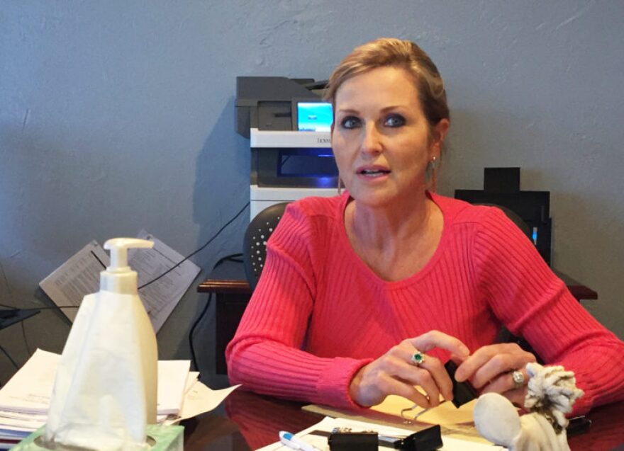 M. Kathi Rawls, an Oklahoma City area attorney, represents consumers in civil cases that involve auto loans, debt collection, repossession and identity theft.