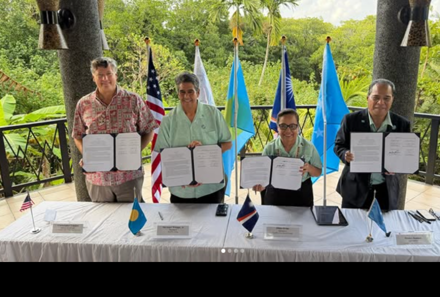 During the Pacific Islands Forum in Palau, from left, acting Peace Corp Director Christopher Landau, President Surangel Whipps Jr. of Palau, President Hilda Heine of the Marshall Islands, and President Wesley Simina of the Federated States of Micronesia sign an agreement stating their mutual interest in the Peace Corps' return to the North Pacific on Sept. 2, 2026.