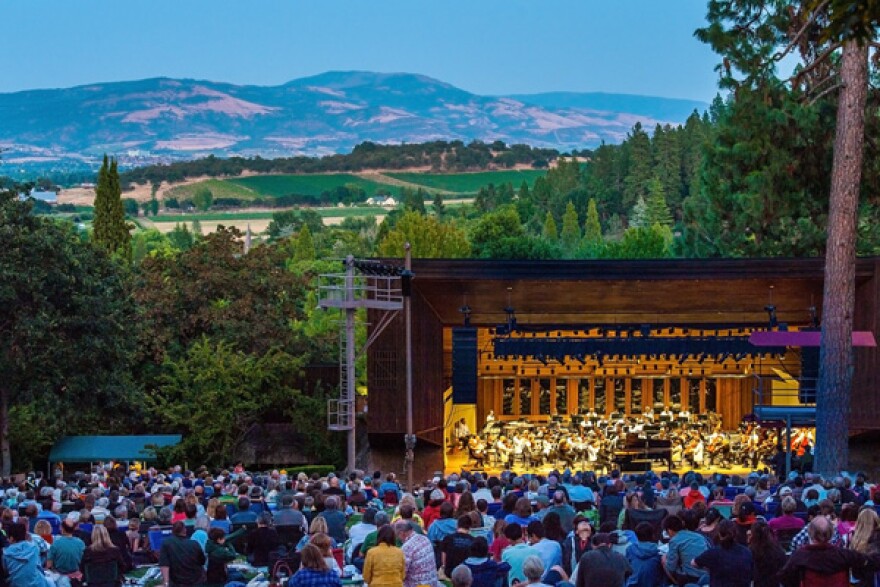 Audiences enjoy hillside seating during an evening Britt Festival performance in Jacksonville, Oregon