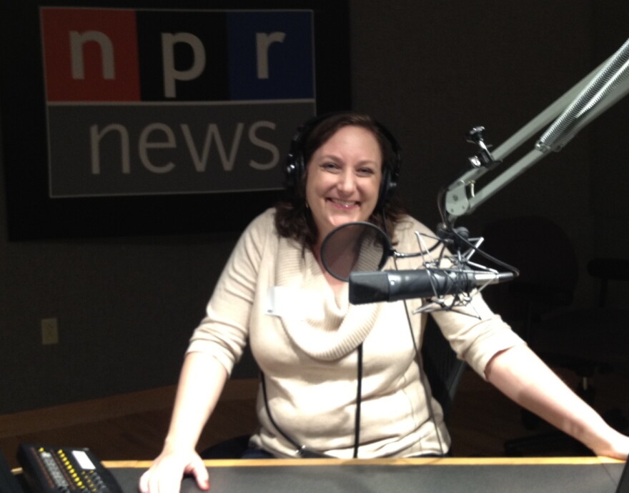Winner Paula Henning enjoys a tour of NPR's headquarters with host/correspondent David Greene.
