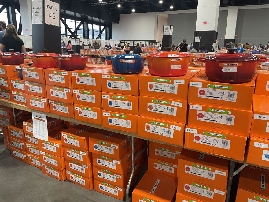 Dutch ovens on sale line tables at the Le Creuset factory-to-table sale in Milwaukee on Oct. 1, 2026 at the Baird Center.