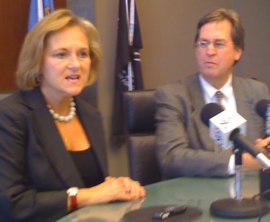 Mayor Kathy Taylor and Mayor-Elect Dewey Bartlett hold a joint news conference at city hall.