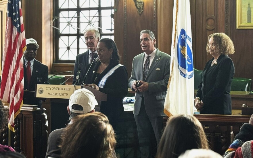 Toni Hendrix, center, was named by the city as Veteran of the Year, in Springfield, Massachusetts.