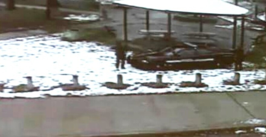 A freeze-frame from surveillance video showing a Cleveland police officer shooting Tamir Rice. 