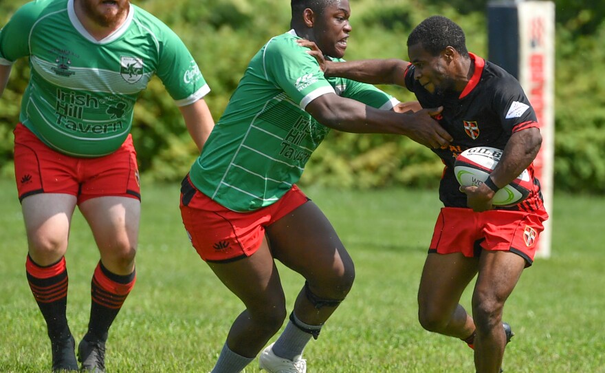 Leroy Senegeledo pushes off a South Jersey player.