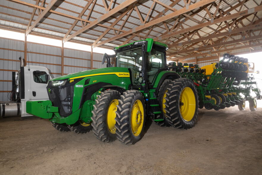 Jake Lieb looks over his John Deere planter on Monday, March 18, 2023, at his farm near Monticello, Ill.