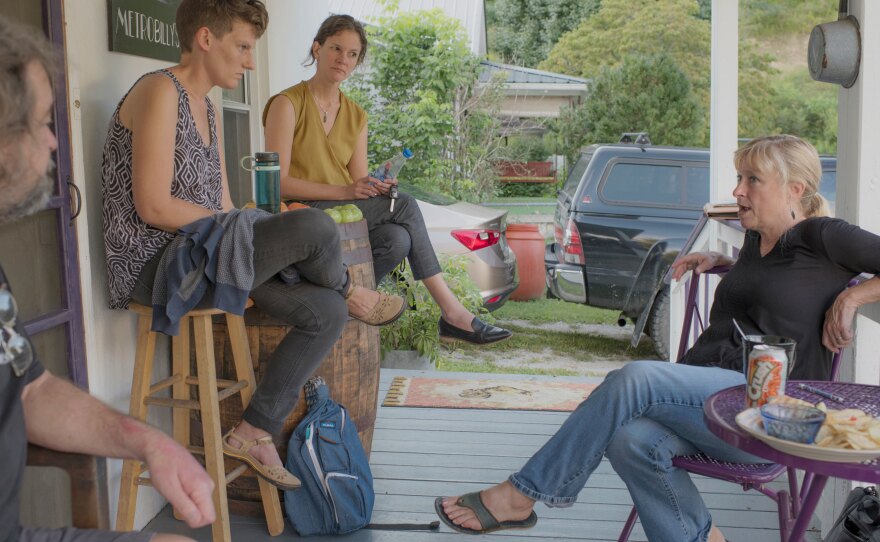 Mickey McCoy (from left), a local activist and Nina's huband; Ricki Draper, a fellow with the Appalachian Citizens' Law Center; Mary Cromer, a staff attorney with the law center; and Nina McCoy meet in August to discuss water issues in Martin County.