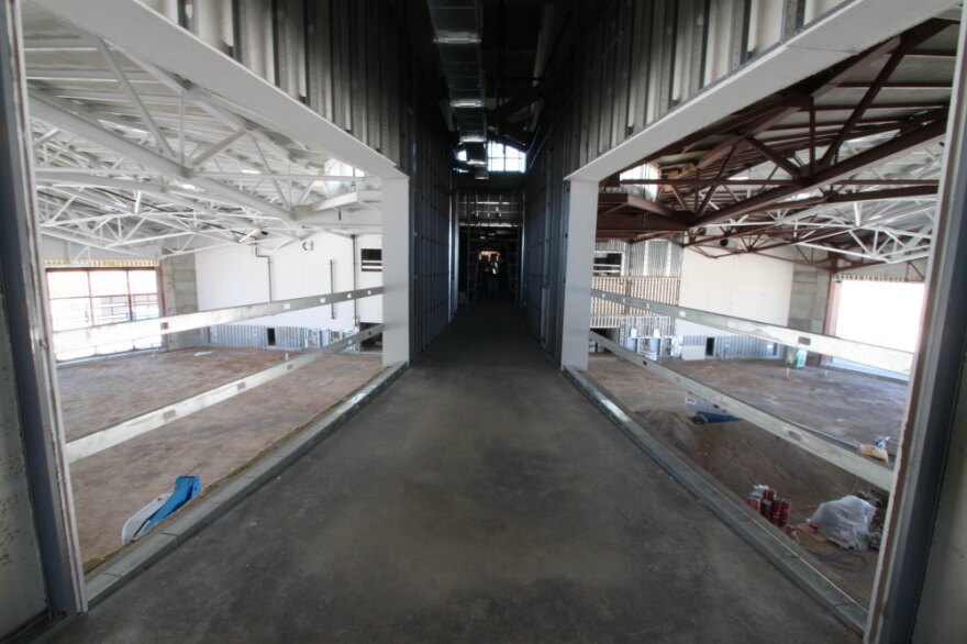 Space tourists will be able to gawk from this walkway at the hangar where Virgin Galactic will store its spacecraft.