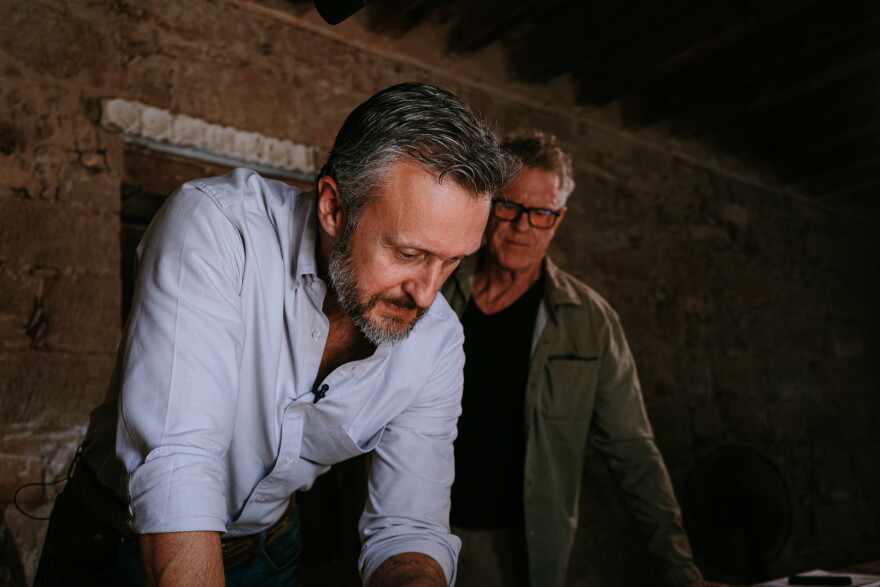 Podcaster Brandon Seale and Frank Briscoe, Conservation Archaeologist, at the Uribe-Trevino House managed by the River Pierce Foundation in San Ygnacio, Texas.
