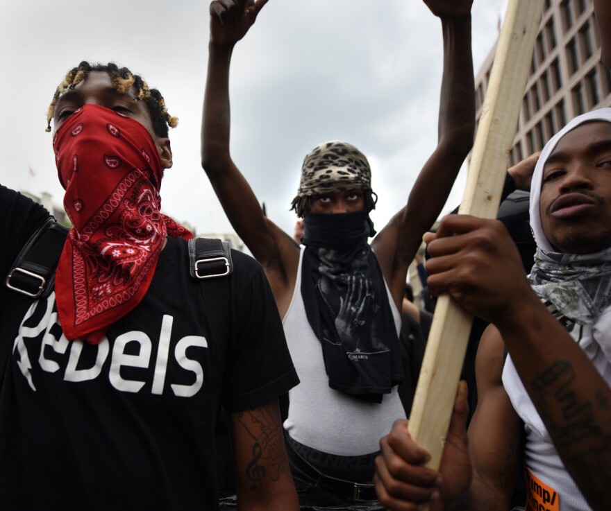 Counter-protesters chant during the Unite the Right 2 rally.