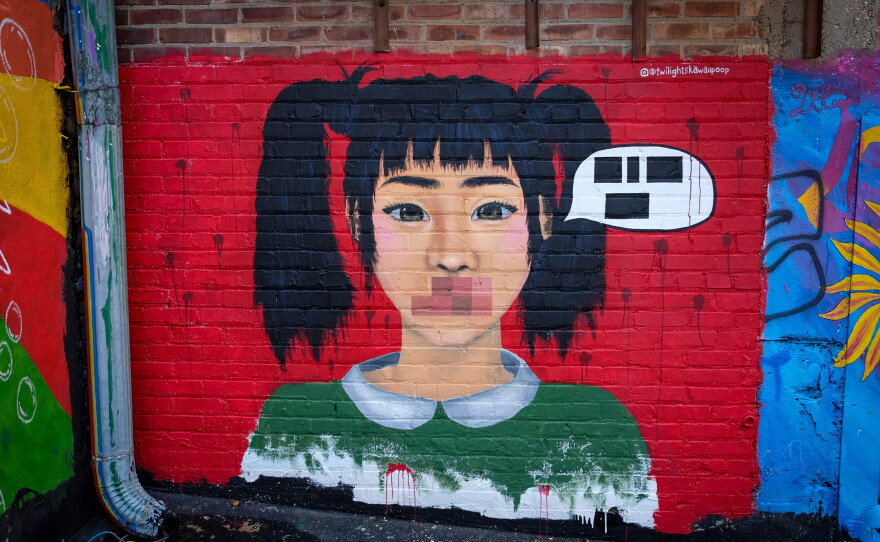 A mural in the alleys of downtown Sioux City.
