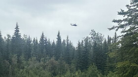 A helicopter passes over a military recreation area outside of Eielson Air Force Base on July 24, 2026.