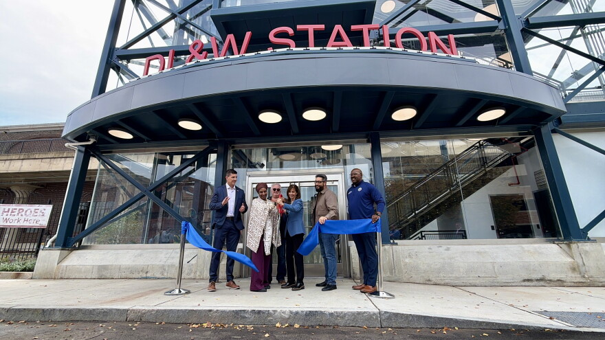 Executive Director of the NFTA, Kimberley Minkel, cuts the ribbon on the new DL&W Sky Deck across the street from the KeyBank Center on October 1, 2026 in downtown Buffalo. She is joined by elected officials.