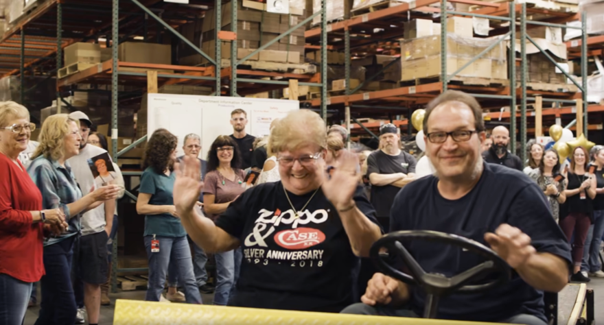 Barb Reid (center) was recently recognized for 60 years of service to the Zippo Manufacturing Company at an annual service awards banquet. 