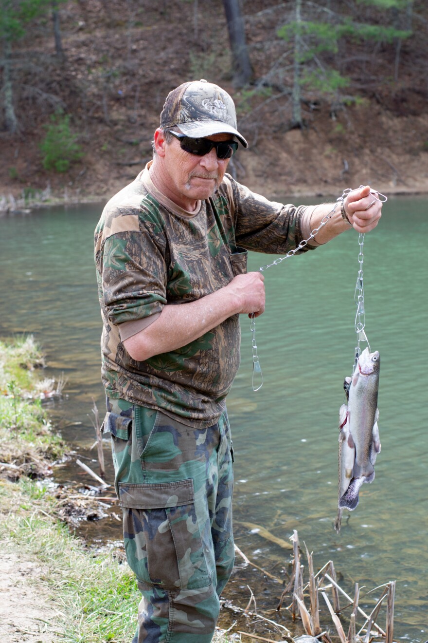Keith Carpenter holds up the afternoon's haul so far