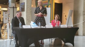 Lt. Gov. Suzanne Crouch speaks to Northwest Indiana tourism professionals, while South Shore CVA President/CEO David Uran and Indiana Destination Development Corporation Secretary and CEO Elaine Bedel listen, at the Indiana Welcome Center on July 26