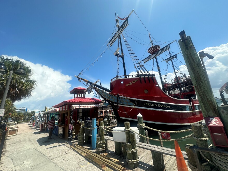 red pirate ship docked at the marina