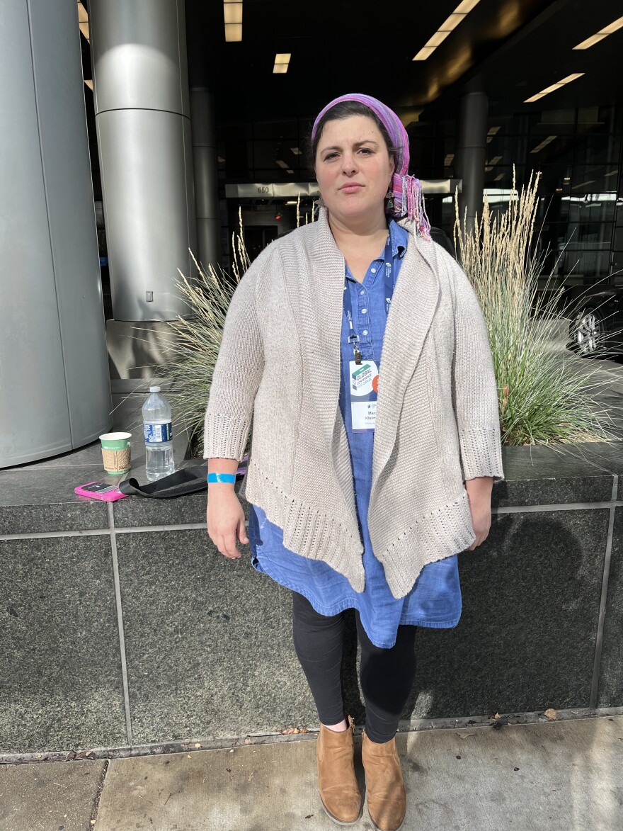 Conference attendee Mara Kleiman stands outside the Global Conference for Israel in downtown Denver on Friday, December 1, 2023. Kleiman wholeheartedly supports Israel but also said pro-Palestinian demonstrators have the right to protest, as long as it's peaceful.