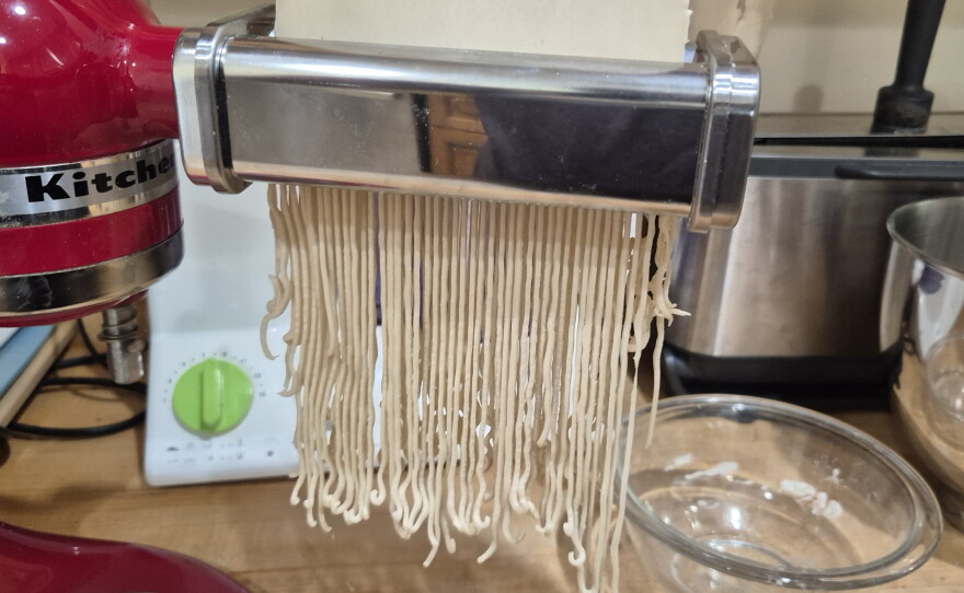 Fr. Ian's attempt at making noodles ended in using the pasta maker.