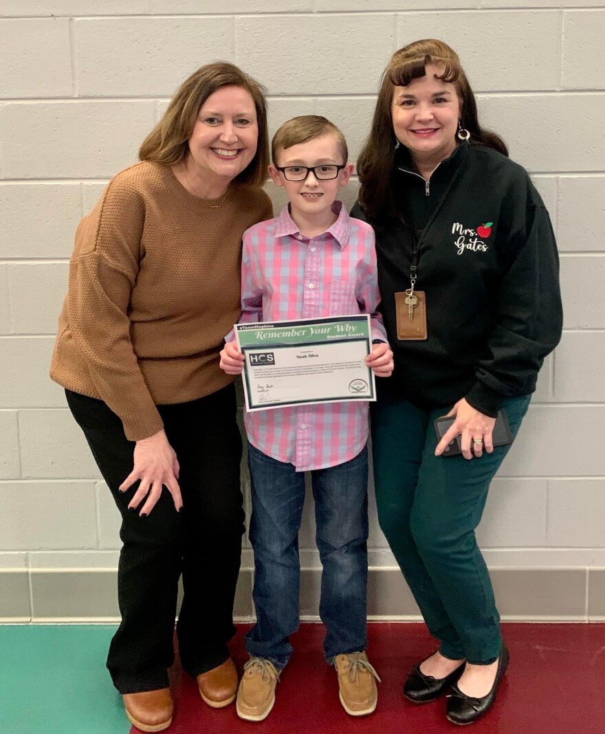 Noah Allen has been recognized for making a difference in the lives of others by the Hopkins County School Board. Pride Elementary Principal Kristy Saint is at left and at right is Noah’s teacher and school garden club sponsor, Kelly Gates.
