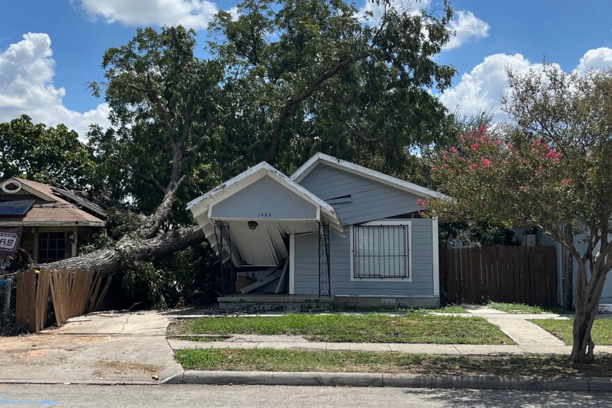 A house crushed by a downed tree from Friday’s storm on Aug. 30, 2026.