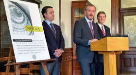 From left, Ryn Vassar, Blake Brickman, Mark Penley, three of four former deputies who brought a suit against Texas Attorney General Ken Paxton, speak at a news conference at the Capitol on Monday, Sept. 25, 2023.