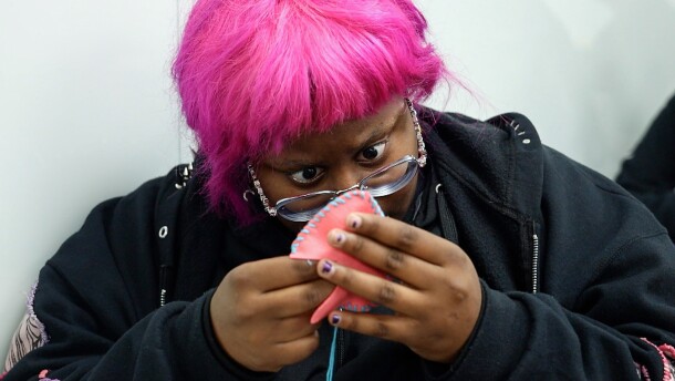 Valentine Johnson hand stitch's a project during a “Global Craftivism, Gender and Handwork” class led by Professor Hinda Mandell at Rochester Institute of Technology in Rochester, N.Y.