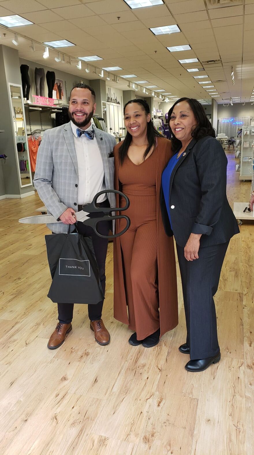 BreAija Bryant (middle) at the grand opening of her store B2the9s with Peoria Mayor Rita Ali (right) and Peoria Area Chamber of Commerce president and CEO Joshua Gunn