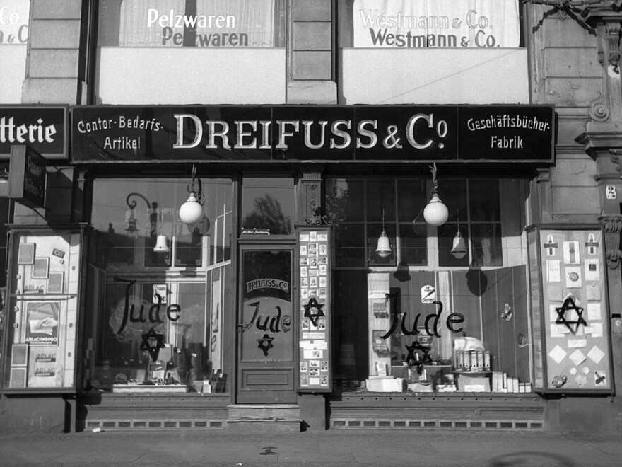 A view of a Jewish-run shop in Germany, after being vandalized by Nazis and covered with anti-Semitic graffiti, on Nov. 10, 1938.