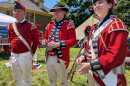 Revolutionary reenactors portray members of the Royal Army