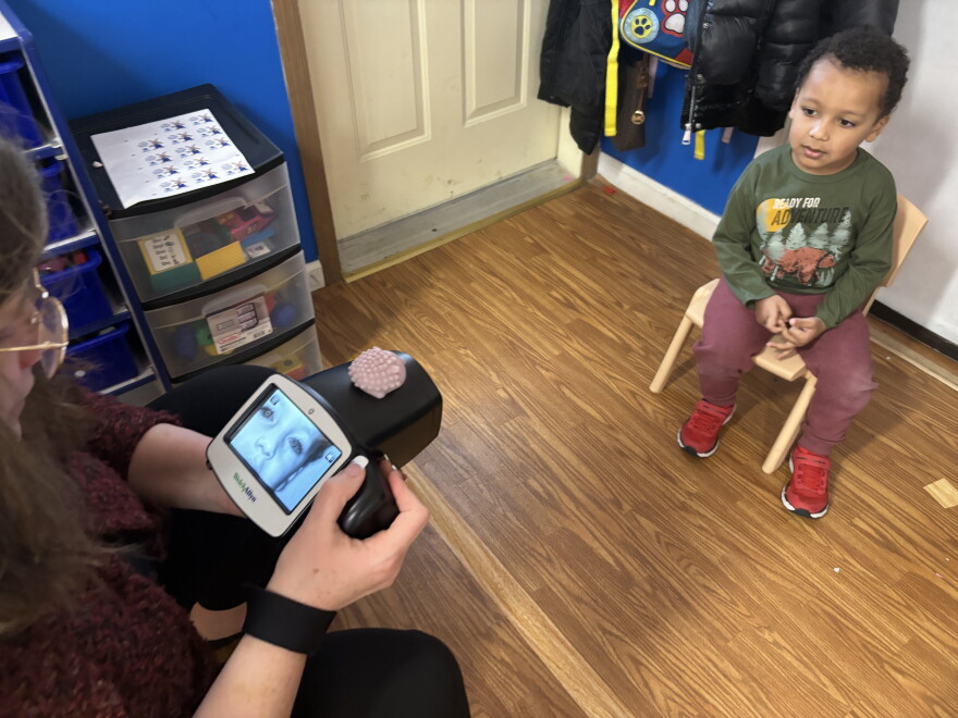 Jennifer Pandolfo uses a Spot Vision Testing Camera