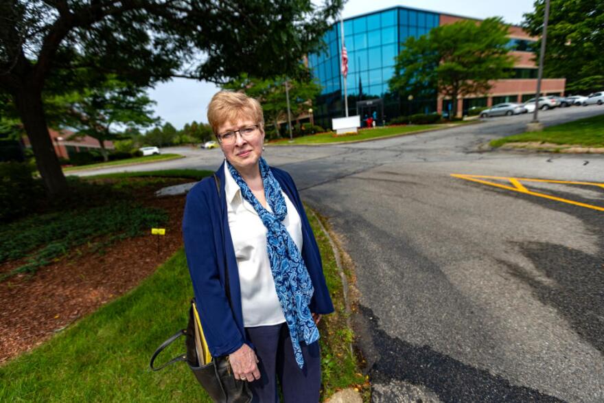 Michele Cantara stands outside of Chelmsford Immigration Court. (Jesse Costa/WBUR)