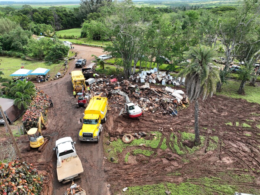 Crews clean up a property on the North Shore of Oʻahu after historic flooding over the weekend. (March 23, 2026)