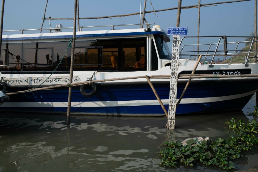 A water level gauge in a tributary of the Surma River in northern Bangladesh. Hundreds of laypeople read these gauges in rivers across the country and send data daily to engineers at Bangladesh's Flood Forecasting & Warning Centre in Dhaka.