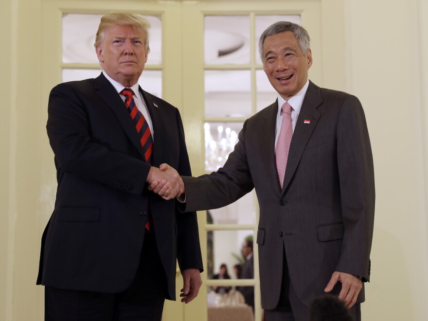 Singapore Prime Minister Lee Hsien Loong meets President Trump ahead of the summit with North Korean leader Kim Jong Un on Monday.