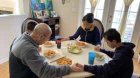 Cary residents Rong Cai and Yanshun Liu  and their two sons