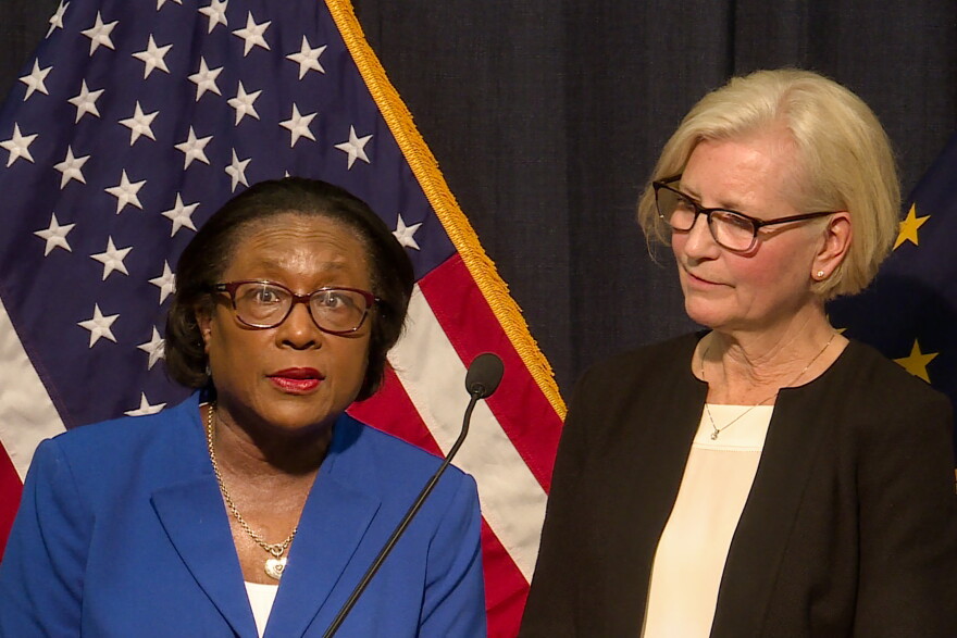 Marion County Health Department Director Virginia Caine and State Health Commissioner Kris Box speak at a press conference Friday. They say an adult man was at a conference in Boston where he was exposed to COVID-19.