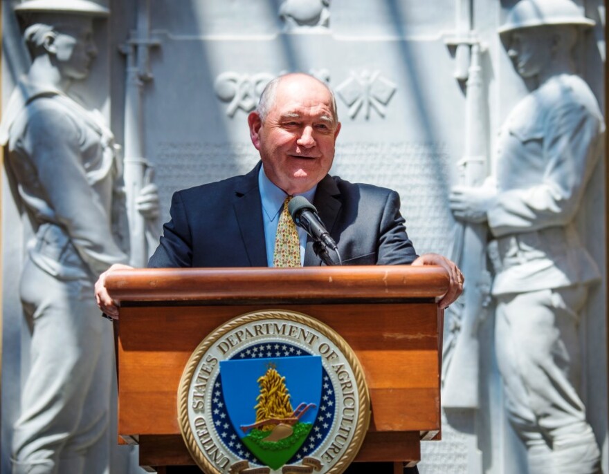 man at podium