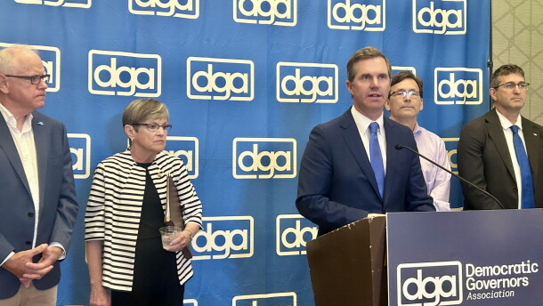 Kentucky Gov. Andy Beshear chairs the Democratic Governors Association. He stands alongside Democratic Governors Tim Walz of Minnesota, Laura Kelly of Kansas, Bob Ferguson of Washington and Matt Meyer of Delaware.