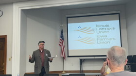 Iowa Farmers Union President Aaron Lehman speaks to union members at the Rock Island Public Library.